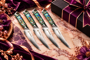 Set of four premium Damascus kitchen knives with iridescent blue-green handles, displayed on rose marble with royal purple velvet, rose-gold accents, and elegant luxury gift packaging for corporate gifting.
