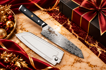 Chef Supply Co. Damascus chef knife with a black honeycomb handle and white leather sheath, displayed on cream marble with burgundy velvet, gold accents, and luxury gift packaging for Employee Appreciation Week.
